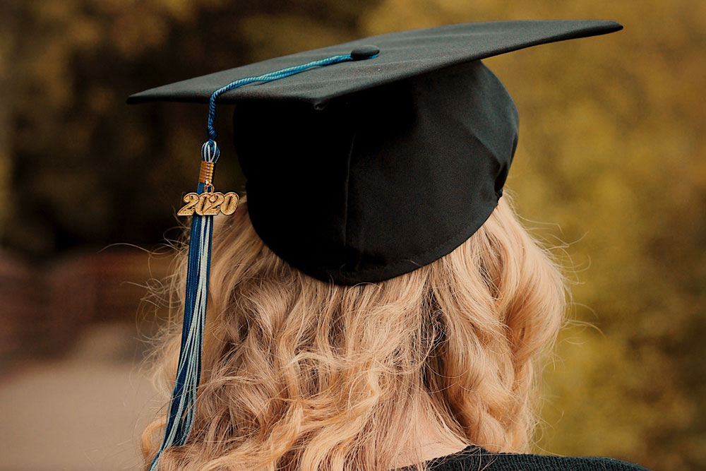 woman wearing mortar board and tassel
